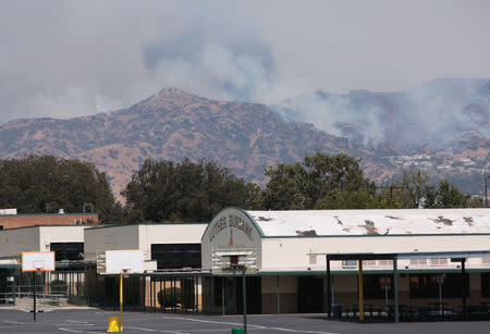 The La Tuna Canyon fire over Burbank, California, September 2, 2017. REUTERS/Kyle Grillot