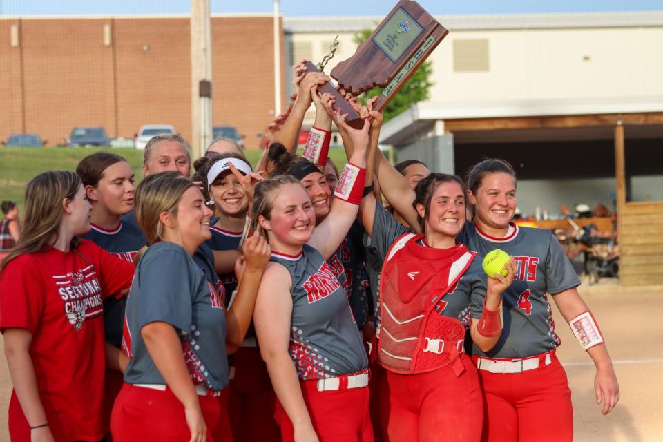 Rossville softball players celebrate after the Hornets' 5-3 victory over Riverton Parke in the Class A regional championship game on May 31, 2022.