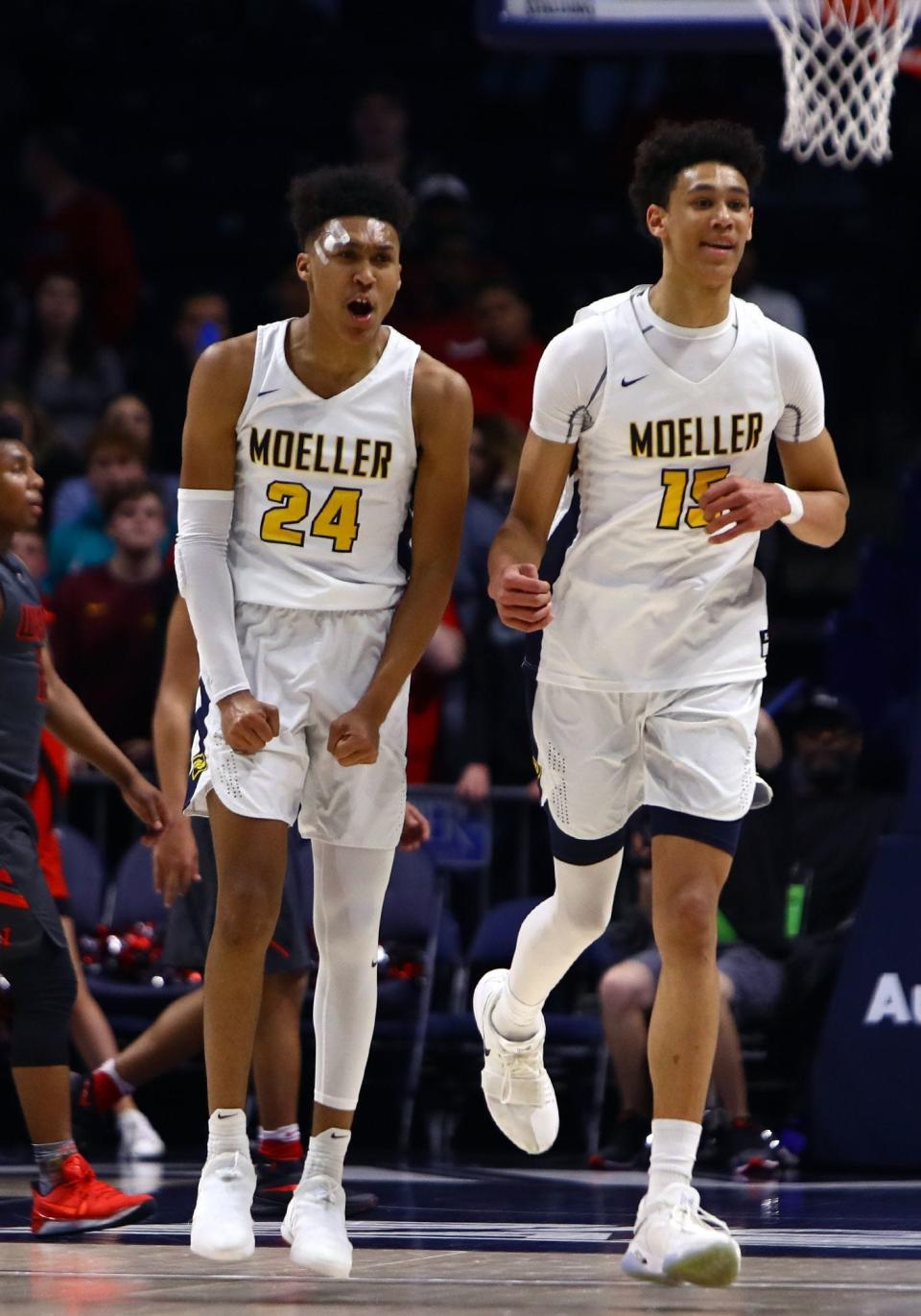 Jeremiah Davenport (24), left, teamed with Jaxson Hayes to lead Moeller to the 2018 Ohio Division I state title. Hayes went on to Texas and  and the NBA New Orleans Pelicans. Davenport is currently a Cincinnati Bearcat.
