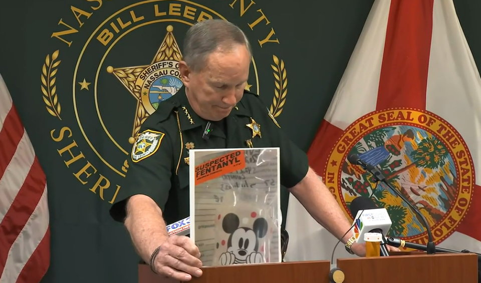 Nassau County Sheriff Bill Leeper displays the baby bottle he said a 17-year-old mother spiked with fentanyl when she wanted to take a nap and her baby as well. The child never woke up. He was announcing the mother's arrest at Wednesday's news conference.