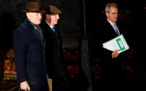 Britain's former Environment Secretary, Owen Paterson (R) Britain's former Work and Pensions Secretary Iain Duncan Smith (L) and former First Minister of Northern Ireland David Trimble, leave from 10 Downing Street in central London on November 19, 2018.  - Credit: TOLGA AKMEN/AFP