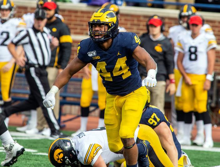 Michigan linebacker Cameron McGrone celebrates his sack of Iowa quarterback Nate Stanley in the fourth quarter of their game in October 2019 in Ann Arbor.