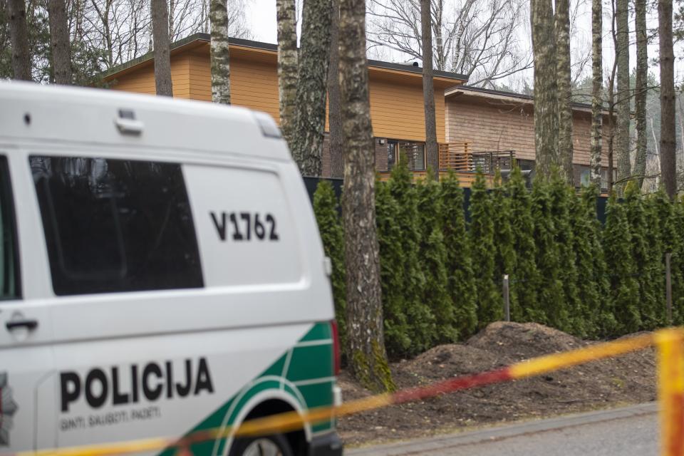 A police car is seen near the house of Leonid Volkov, a close associate of the late Russian opposition leader Alexei Navalny, in Vilnius, Lithuania, Wednesday, March 13, 2024. Volkov on Wednesday blamed the government of Russian President Vladimir Putin after he was attacked with a hammer and tear gas outside his home near the Lithuanian capital, where he lives in exile, the late Navalny's anti-corruption foundation said.(AP Photo/Mindaugas Kulbis)