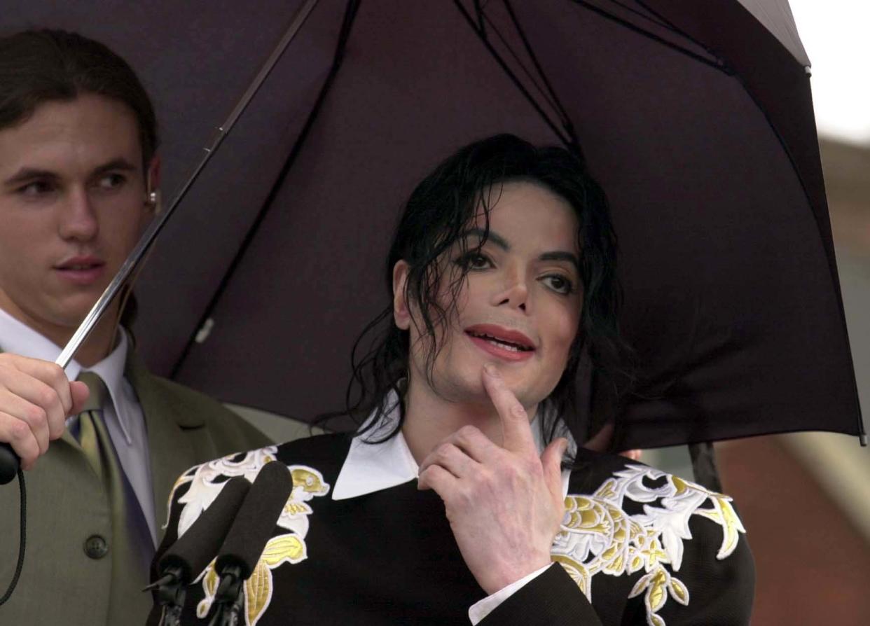 Pop legend Michael Jackson attends a fundraising event in aid of Children with Aids and Support for Africa at Exeter Football Club at St James Park, Exeter in Devon.  *15/06/02 Michael Jackson. Pop legend Michael Jackson has backed England's football team to beat Denmark in today's, Saturday 15th June 2002, crucial second round World Cup match. The vote of confidence came as the singer maintained his oddball reputation by making an appearance at the ground of a third division soccer club.