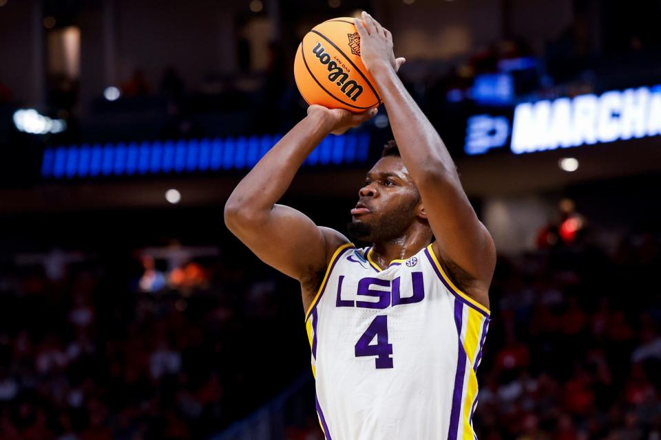 Mar 18, 2022; Milwaukee, WI, USA; LSU Tigers forward Darius Days (4) shoots the ball against the Iowa State Cyclones in the first half during the first round of the 2022 NCAA Tournament at Fiserv Forum. Mandatory Credit: Jeff Hanisch-USA TODAY Sports