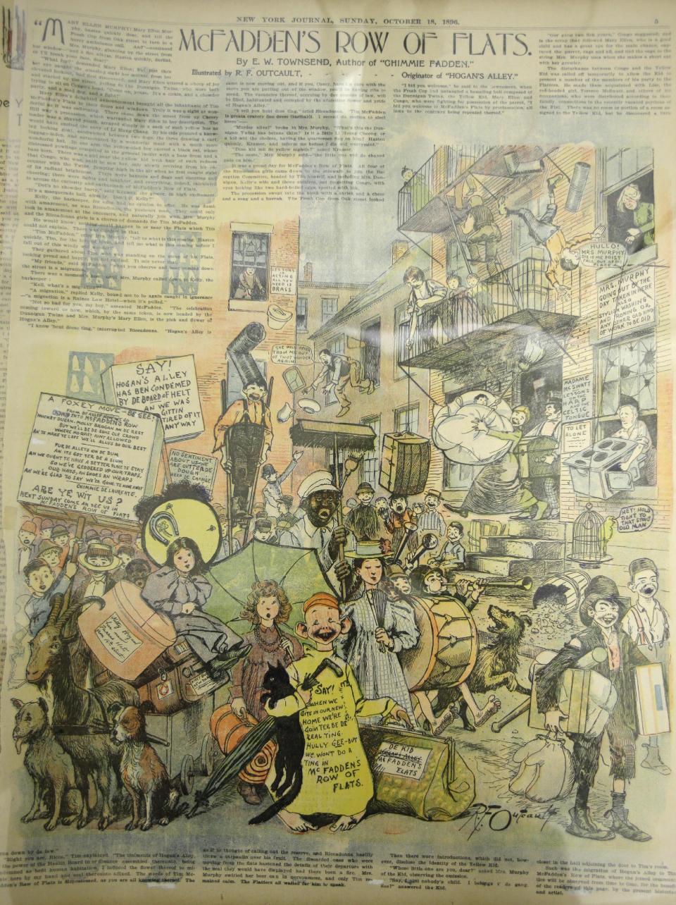 This Wednesday, Oct. 23, 2013 photo shows a comic called "Hogan's Alley" by Richard F. Outcault from Oct. 18, 1896 in Columbus, Ohio. The Billy Ireland Cartoon Library and Museum, named for the former Columbus Dispatch editorial cartoonist whose family donated millions for project, includes 13,000 square feet of archives stored on rows and rows of motorized shelves and a reading room offering public access to almost everything there. (AP Photo/Tony Dejak)