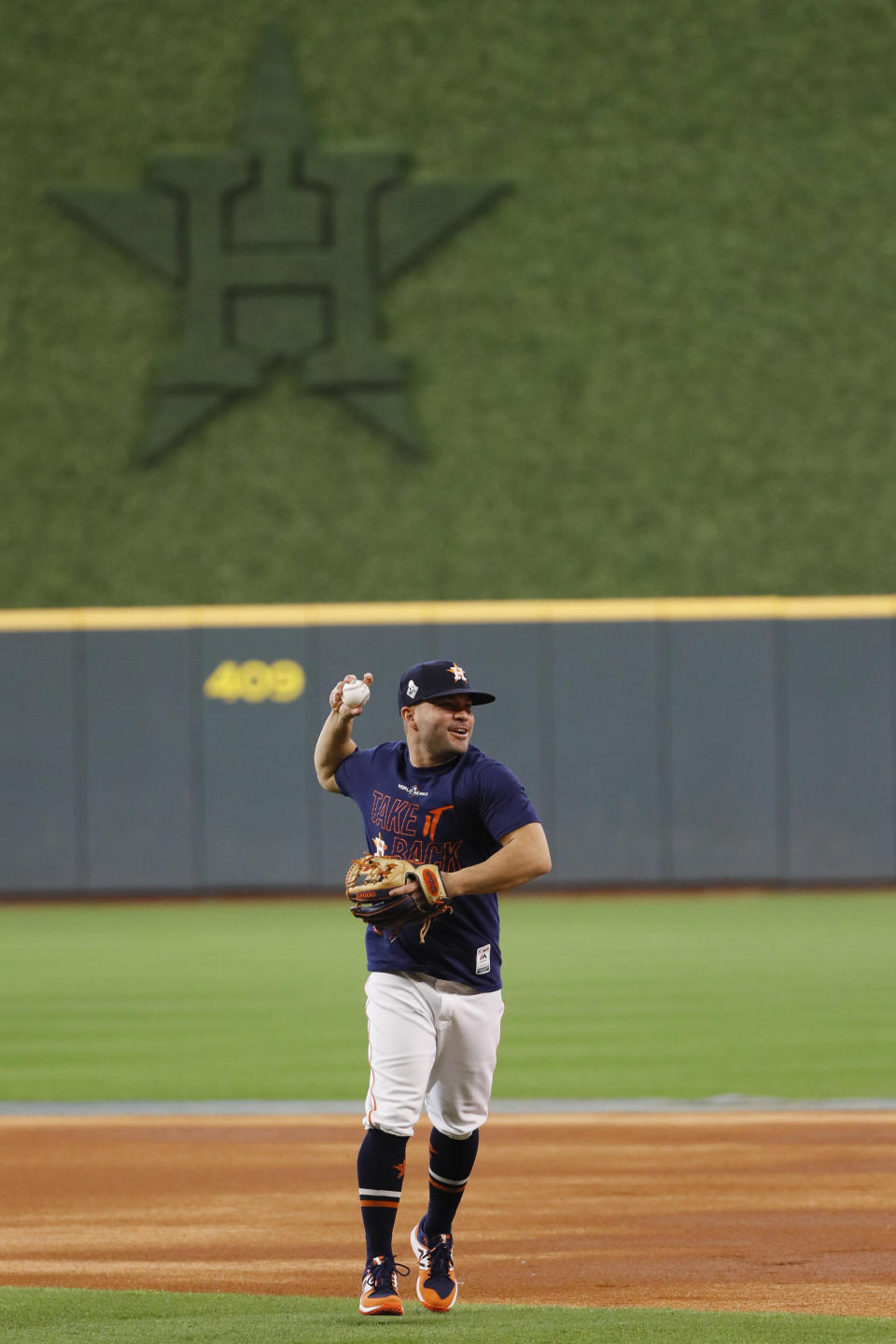 Houston Astros second baseman Jose Altuve warms up during batting practice for baseball's World Series Monday, Oct. 21, 2019, in Houston. The Houston Astros face the Washington Nationals in Game 1 on Tuesday. (AP Photo/Matt Slocum)