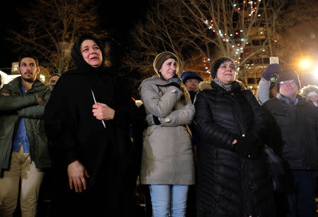 Halifax area residents react as they gather for a vigil in support of a Syrian refugee family who lost seven children killed in a house fire in the community of Spryfield earlier in the week, in Halifax, Nova Scotia, Canada, February 20, 2019, REUTERS/Ted Pritchard