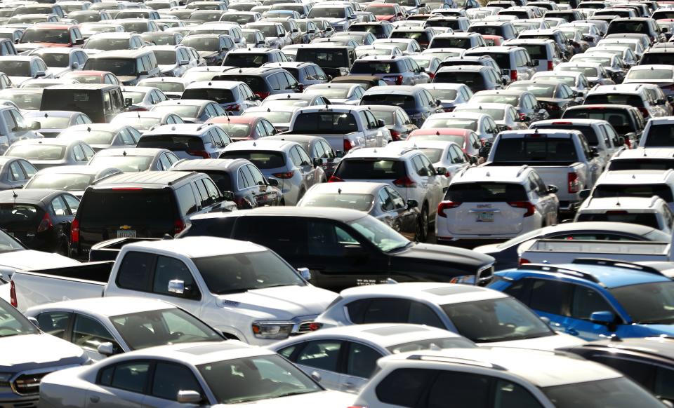 More than 1,000 rental cars sit in a parking lot near Priest Dr. and Van Buren St. in Phoenix, Ariz. on April 6, 2020.