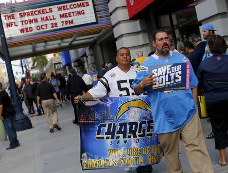 San Diego Chargers football fans gather outside a downtown theatre as the National Football League hosts a forum to take public input on their team relocation procedures in San Diego, California in this October 28, 2015 file photo. REUTERS/Mike Blake/Files