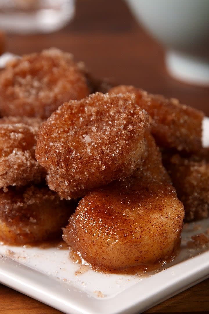 <p>When we're craving a doughnut, but really want to be healthy, we compromise with these cinnamon sugar bananas. We highly suggest you do the same.</p><p>Get the <a href="https://www.delish.com/uk/cooking/recipes/a31728381/churro-banana-bites-recipe/" rel="nofollow noopener" target="_blank" data-ylk="slk:Churro Banana Bites;elm:context_link;itc:0;sec:content-canvas" class="link ">Churro Banana Bites</a> recipe.</p>