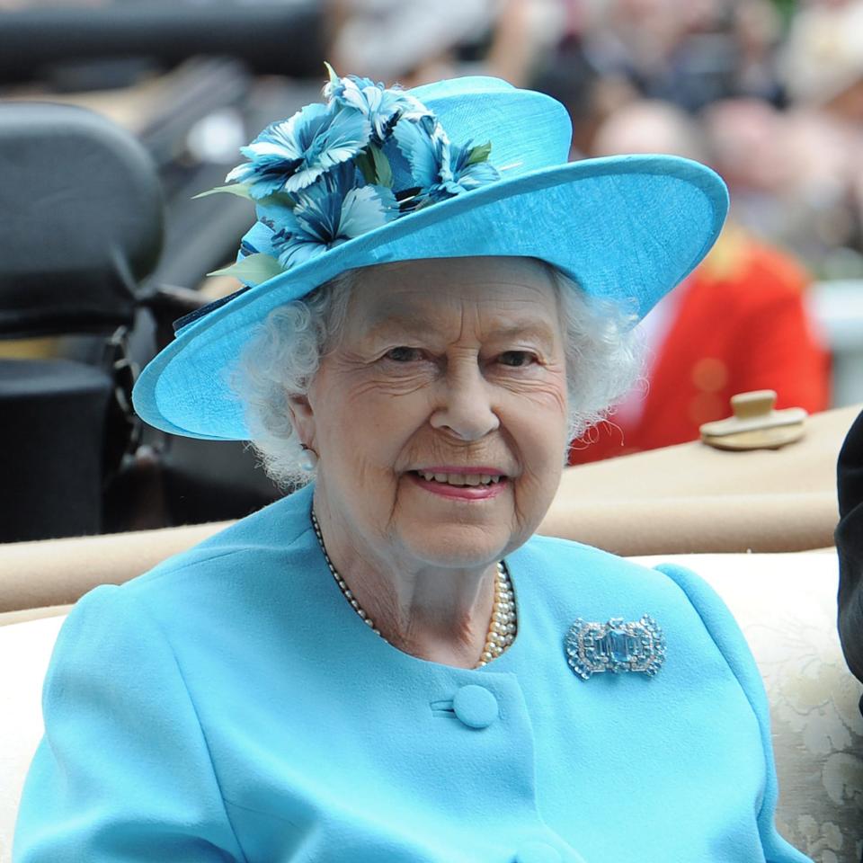 The Queen wearing her mother's aquamarine and diamond brooch at Royal Ascot in 2014 - Stuart C. Wilson/Getty Images