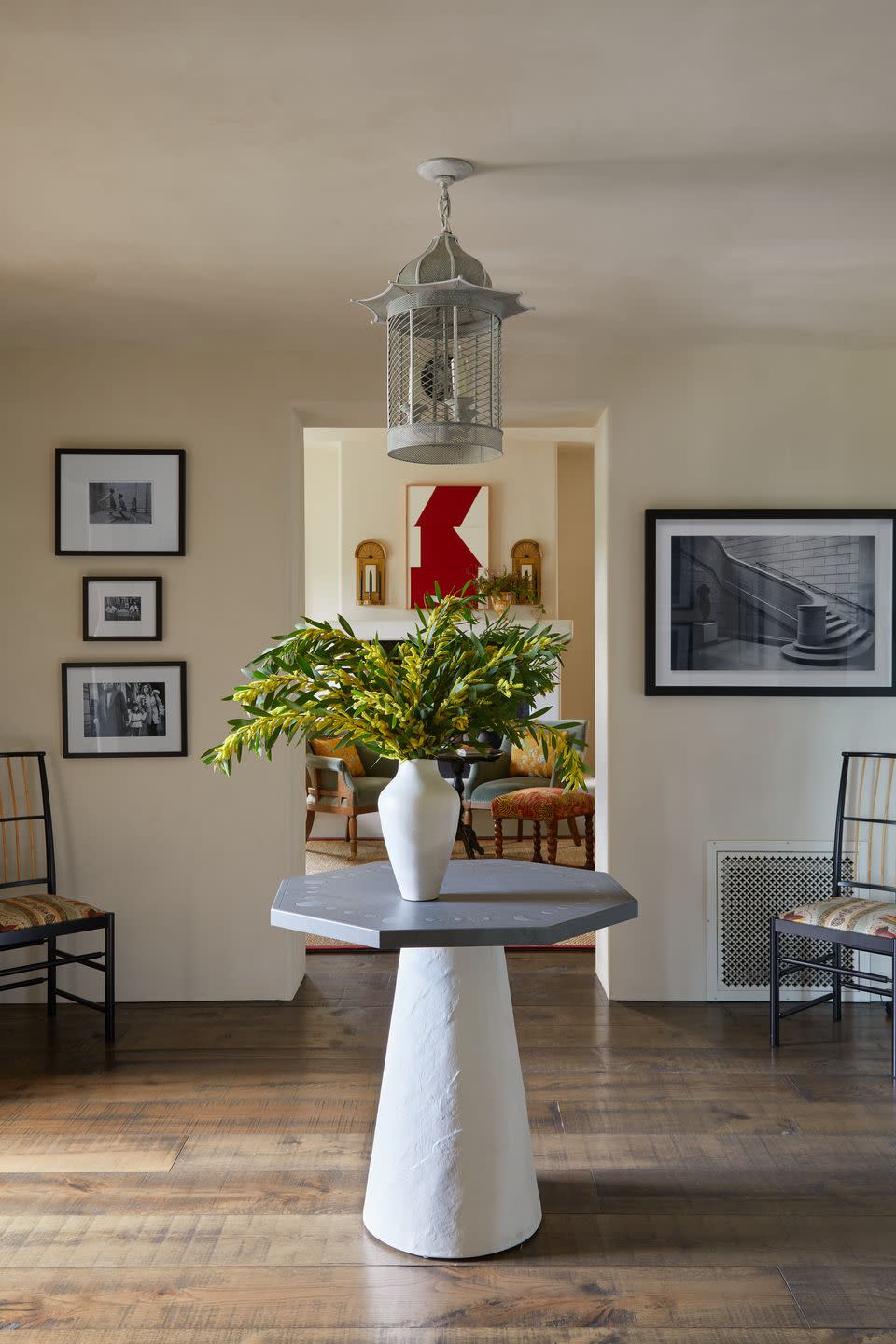 a vase with flowers on a table