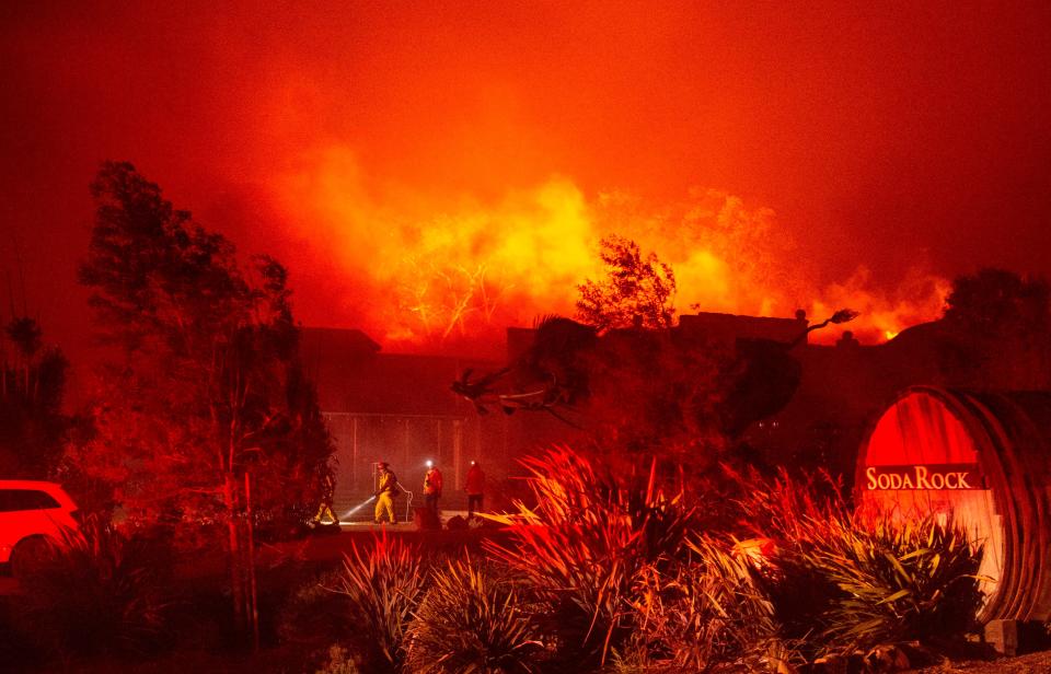 The Soda Rock Winery goes up in flames, caught up in the Kincade Fire in Healdsburg, California.