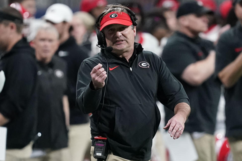 Georgia head coach Kirby Smart gestures during the first half of the Southeastern Conference championship NCAA college football game against Alabama in Atlanta, Saturday, Dec. 2, 2023. (AP Photo/Mike Stewart)