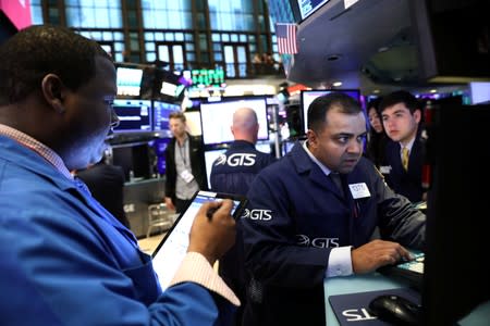 Traders work on the floor during The Slack Technologies Inc. direct listing at the New York Stock Exchange (NYSE) in New York