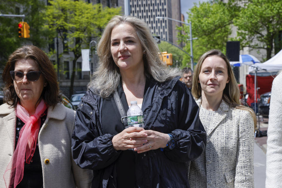 Natasha Stoynoff walks outside federal court in New York, Wednesday, May 3, 2023. Stoynoff, a former People magazine staff writer, will testify that former President Donald Trump pinned her against a wall and forcibly kissed her at his Florida mansion when she went there in 2005 to interview him and his then-pregnant wife Melania Trump. (AP Photo/Stefan Jeremiah)