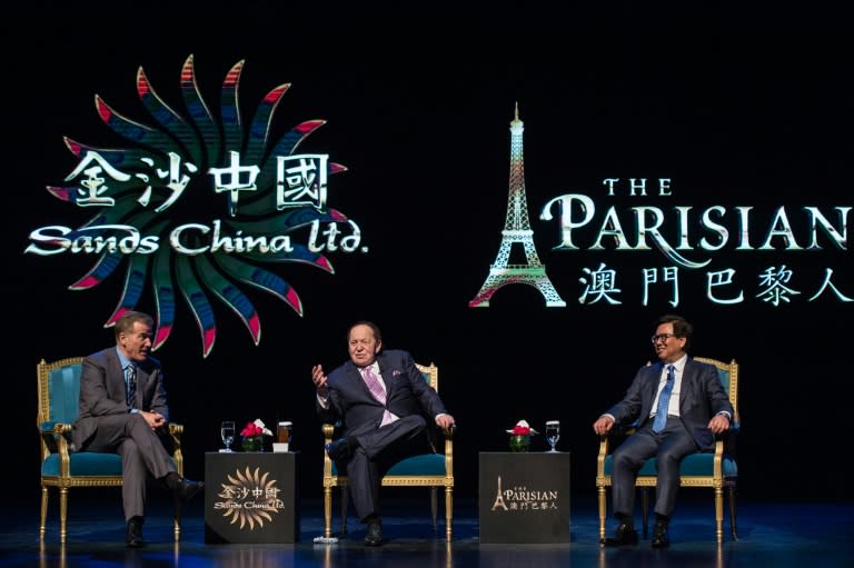 Chairman of the Las Vegas Sands Corporation Sheldon Adelson (C) during a press conference with Robert Goldstein, the corporation's president (L), before the opening of the Sands new mega resort 'The Parisian' in Macau, on September 13, 2016