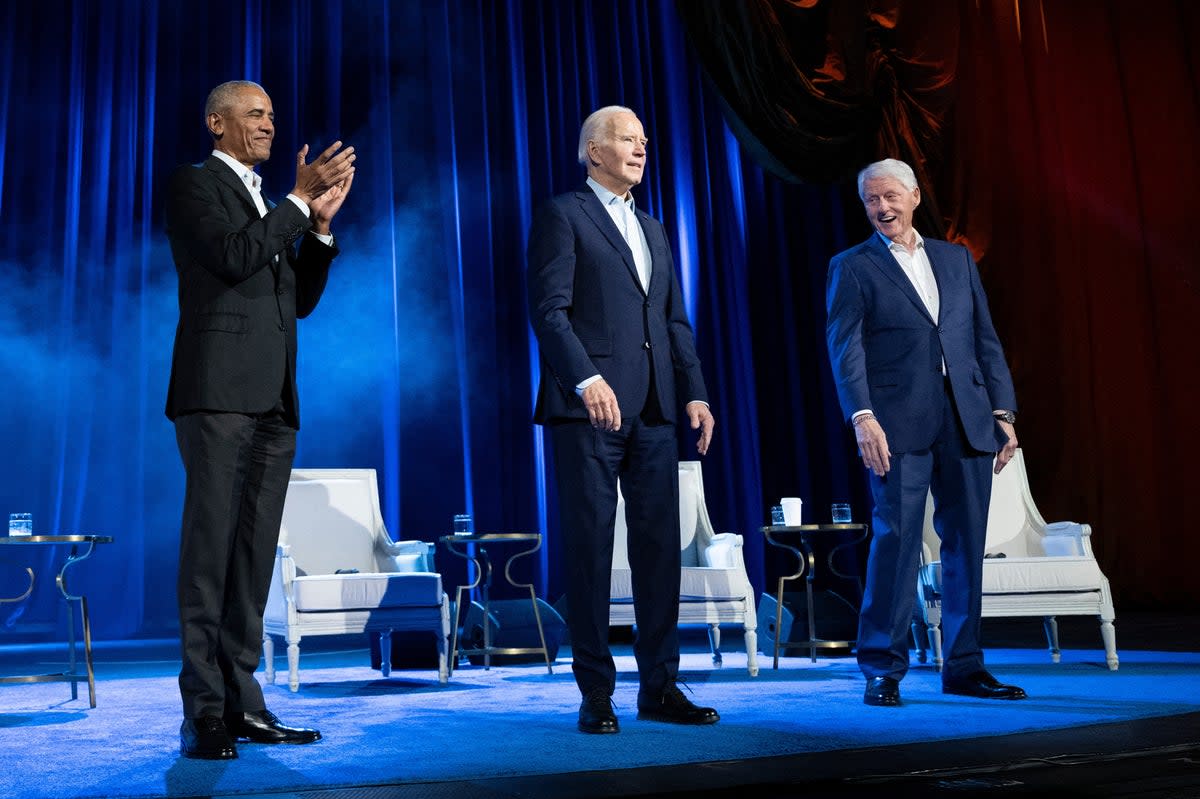 Former presidents Barack Obama and Bill Clinton and current President Joe Biden helped raise $26m during a fundraiser in New York on 28 March, adding to Mr Biden’s fundraising lead (AFP via Getty Images)
