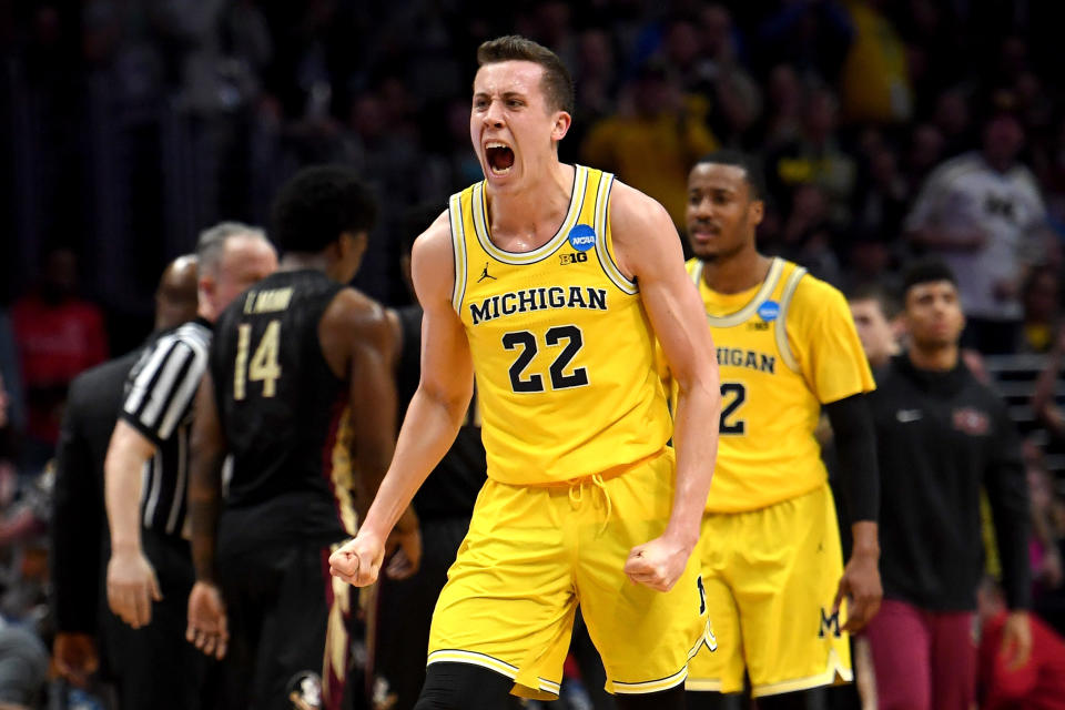 LOS ANGELES, CA - MARCH 24:  Duncan Robinson #22 of the Michigan Wolverines reacts in the second half while taking on the Florida State Seminoles in the 2018 NCAA Men's Basketball Tournament West Regional Final at Staples Center on March 24, 2018 in Los Angeles, California.  (Photo by Harry How/Getty Images)