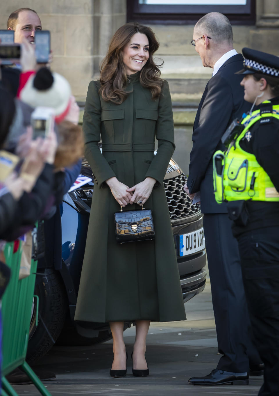 The Duchess of Cambridge debuted her latest Aspinal of London bag at City Hall in Bradford to join a group of young people from across the community to hear about life in the city. [Photo: Getty]