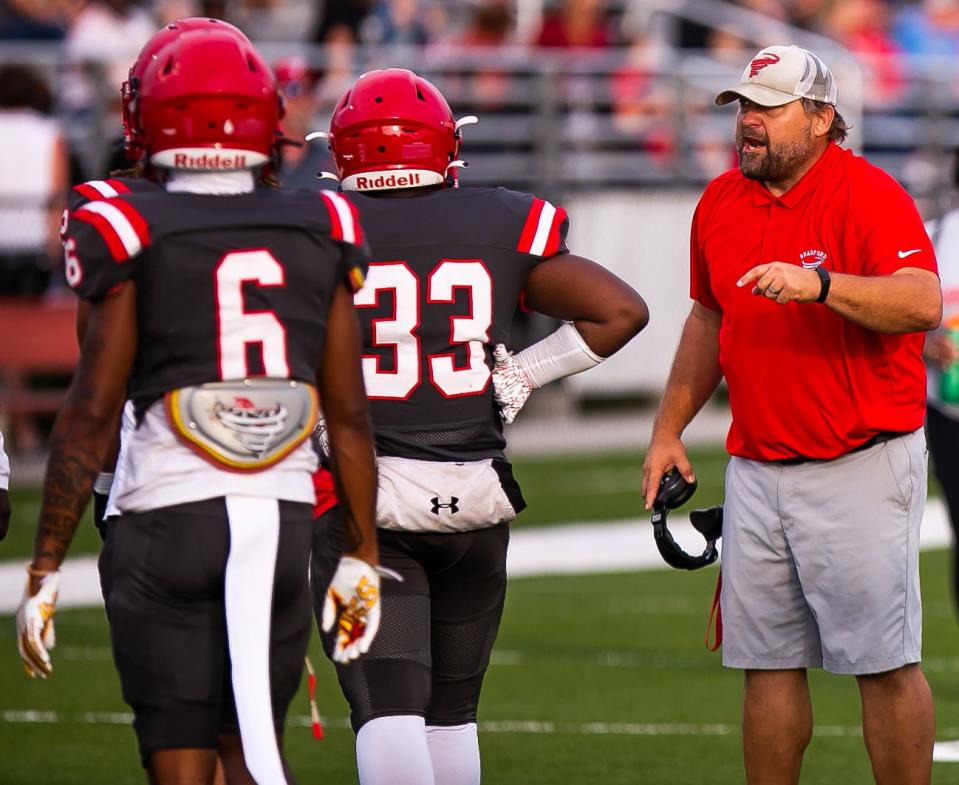 Bradford Head Coach Jamie Rogers has words with his defense. The Bradford Tornadoes hosted the Buchholz Bobcats at Bradford High School in Starke, FL on Thursday, May 25, 2023. [Doug Engle/Gainesville Sun]