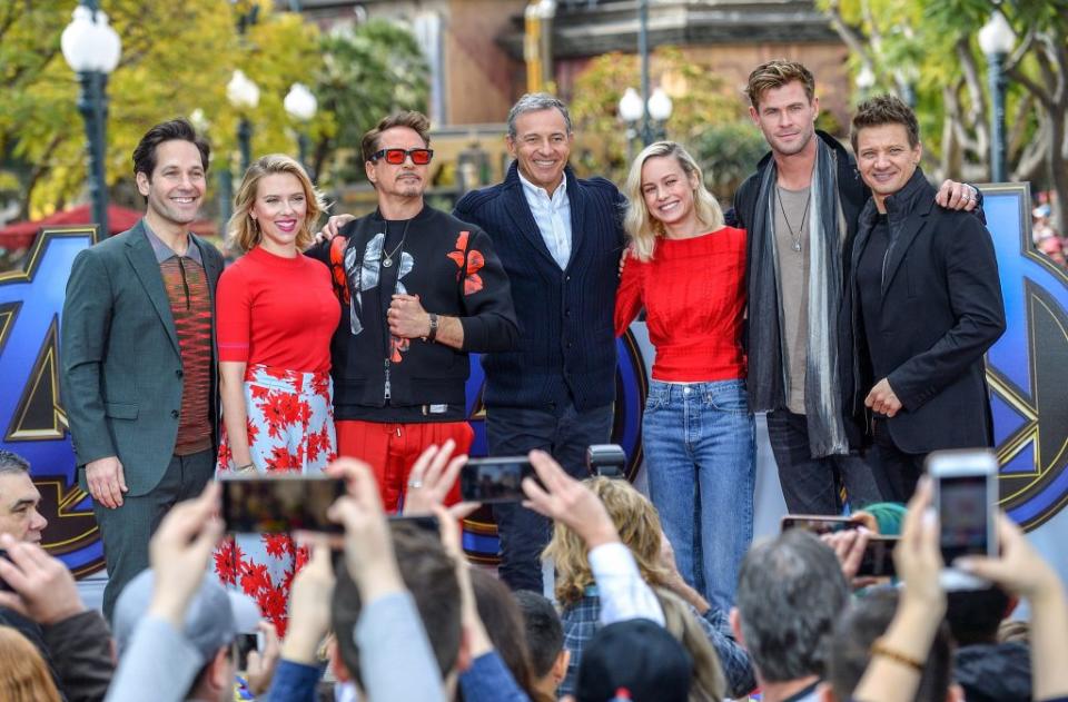 ANAHEIM, CA - APRIL 05: Paul Rudd (Antman), left, Scarlett Johansson (Black Widow), Robert Downey, Jr (Ironman), Disney CEO Bob Iger, Brie Larson (Captain Marvel), Chris Hemsworth (Thor) and Jeremy Renner (Hawkeye) acknowledge the crowd after announcing charitable contributions during a media event at the Disneyland Resort in Anaheim, CA, on Friday, Apr 5, 2019. Avengers; Robert Downey Jr., Chris Hemsworth, Scarlett Johansson, Jeremy Renner, Paul Rudd and Brie Larson, along with Disney CEO Bob Iger announced a donation of more than $5 million to nonprofits supporting children with critical illnesses, including $1 million in cash from Disney to Starlight Children"u2019s Foundation. (Photo by Jeff Gritchen/MediaNews Group/Orange County Register via Getty Images)