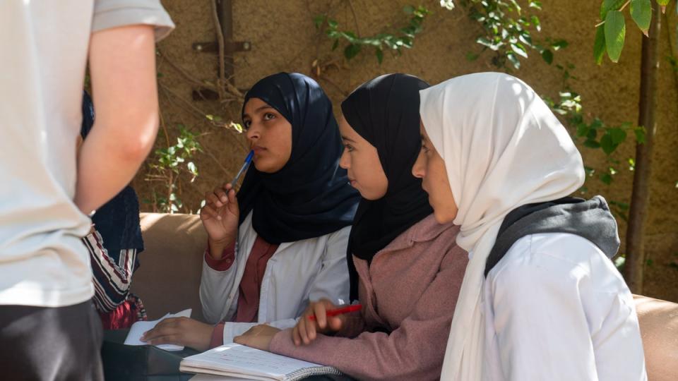 Girls focus on an English lesson given by a volunteer in their boarding house in Asni, Morocco (Alex Goldsmith/Evening Standard)