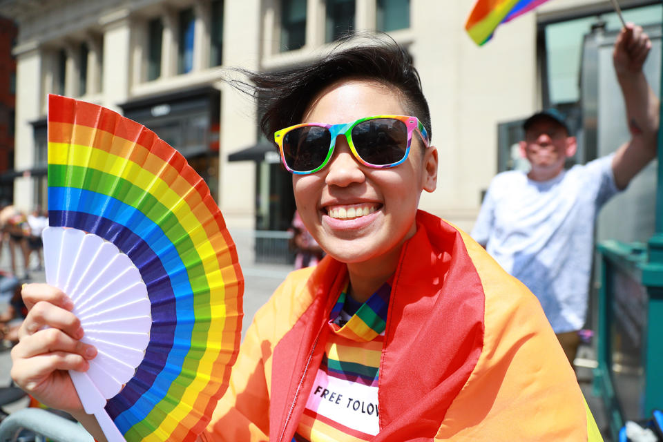 Participants are ready with rainbow colored flags for a hot day at the NYC Pride Parade in New York, Sunday, June 30, 2019. (Gordon Donovan/Yahoo News)