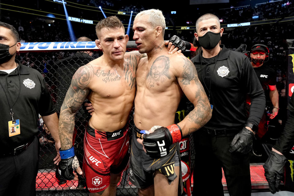 LAS VEGAS, NEVADA - DECEMBER 11: Dustin Poirier congratulates Charles Oliveira of Brazil after their UFC lightweight championship bout during the UFC 269 on December 11, 2021 in Las Vegas, Nevada. (Photo by Jeff Bottari/Zuffa LLC)