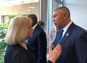 FILE - In this June 28. 2019, file photo, Rep. William Lacy Clay, right, D-Mo., speaks with St. Louis Mayor Lyda Krewson after a news conference in St. Louis. Cori Bush, a onetime homeless woman who led protests following a white police officer's fatal shooting of a Black 18-year-old in Ferguson, ousted longtime Rep. Clay on Tuesday, Aug. 4, 2020, in Missouri's Democratic primary, ending a political dynasty that has spanned more than a half-century. Bush's victory came in a rematch of 2018, when she failed to capitalize on a national Democratic wave that favored political newcomers such as Bush’s friend, Rep. Alexandria Ocasio-Cortez. (AP Photo/Jim Salter, File)