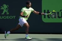 Mar 28, 2017; Miami, FL, USA; Rafael Nadal of Spain hits a forehand against Nicolas Mahut of France (not pictured) on day eight of the 2017 Miami Open at Crandon Park Tennis Center. Mandatory Credit: Geoff Burke-USA TODAY Sports