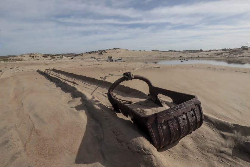 MARINA, CA, WEDNESDAY, JANUARY 26, 2020 - Dredging equipment sits dormant on the sand of the Marina Dunes, where a Cemex processing plant continues to operate. (Robert Gauthier/Los Angeles Times)