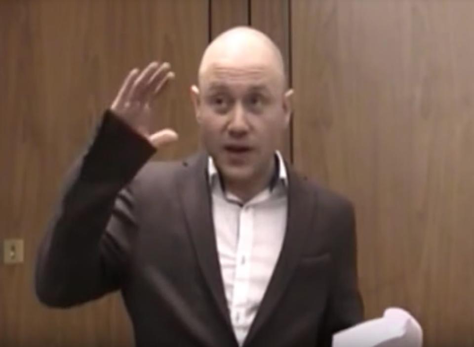 Andrew Anglin,&nbsp;wearing&nbsp;an oversized sport coat, delivers a racist, anti-Semitic speech in London in April 2014. (Photo: )