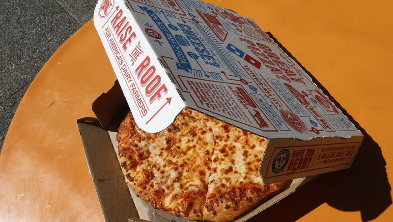 A small pizza made in a Domino’s Pizza shop. National Pi Day is on March 14, and a number of restaurants are offering deals on pizza for the occasion. 