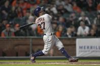 Houston Astros' Jose Altuve watches his solo home run against the San Francisco Giants during the fifth inning of a baseball game Friday, July 30, 2021, in San Francisco. (AP Photo/Tony Avelar)