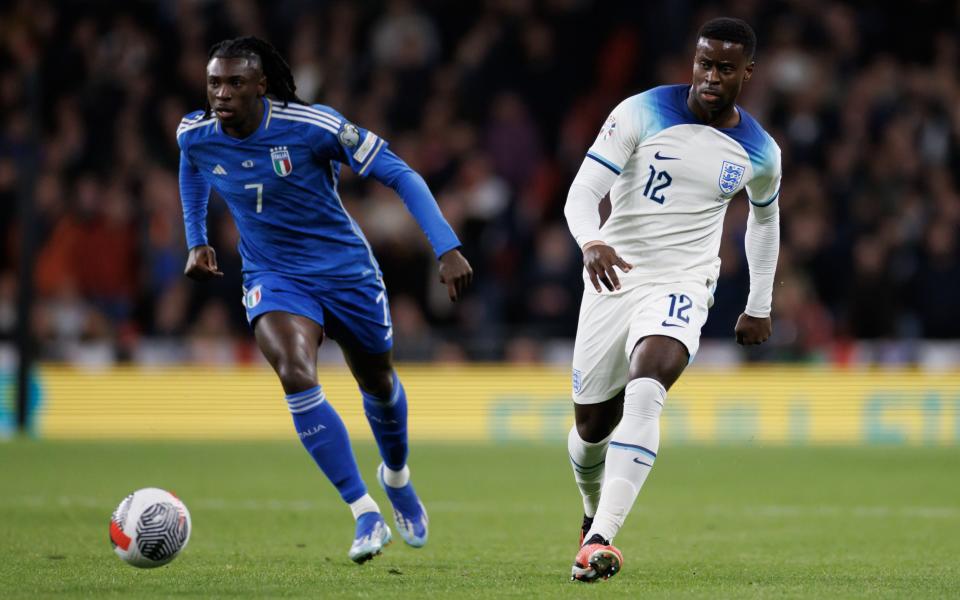 Marc Guehi of England in action with Moise Kean of Italy