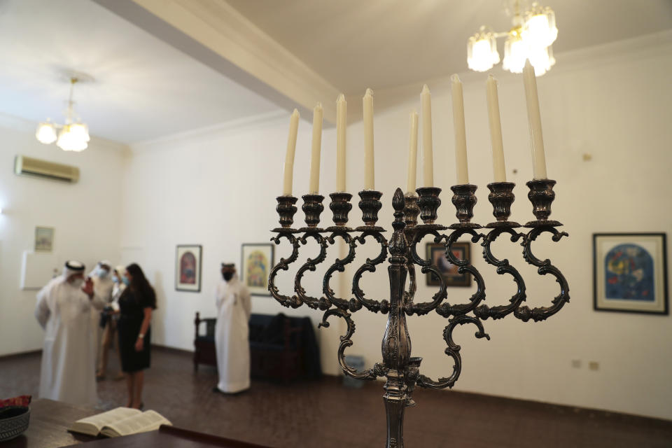 FILE - In this Oct. 18, 2020 file photo, a menorah used during the Jewish holiday of Hanukkah, is seen during a visit by an Israeli delegation to the Jewish Community Synagogue of Bahrain, in Manama, Bahrain. Half a year after the United Arab Emirates and Bahrain established diplomatic relations with Israel, Gulf Jewish communities are emerging from the shadows and raising their public profiles. (Ronen Zvulun/Pool Photo via AP)