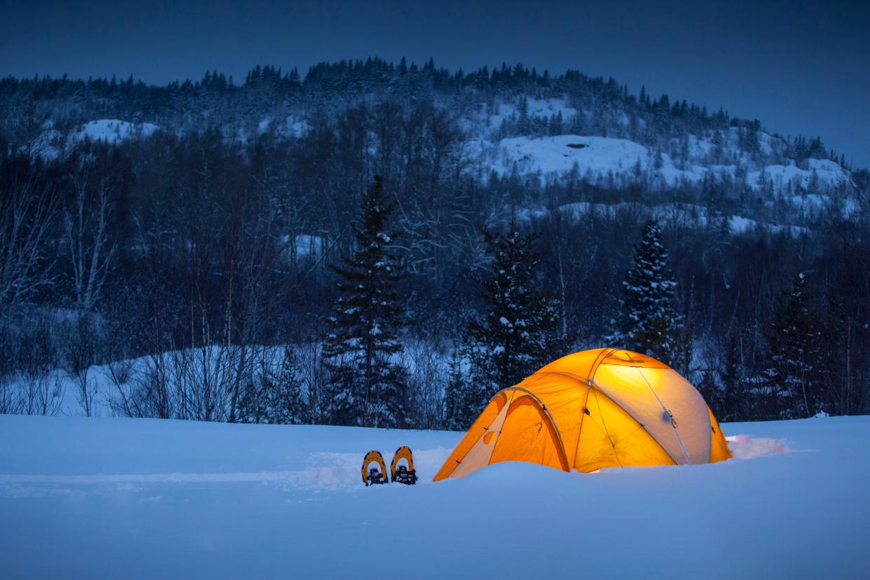 This archive photo shows winter camping in a tent. A trio in Colorado were found dead near a remote campsite and investigators believe they were attempting to "live off the grid" when they died of exposure and malnutrition during the winter.