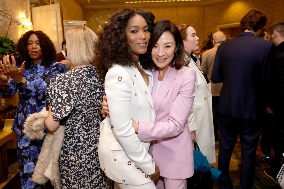 Angela Bassett, left, and Michelle Yeoh at the BAFTA Tea Party in Los Angeles on Jan. 14.