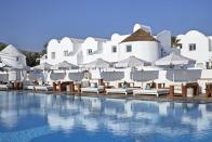 <p>If you’re looking for a hint of party and glamour, instead of honeymoon romance overload, then Ibiza institution <a href="https://www.booking.com/hotel/gr/nikki-beach-resort-amp-spa-santorini.en-gb.html?aid=2200764&label=best-hotels-santorini" rel="nofollow noopener" target="_blank" data-ylk="slk:Nikki Beach;elm:context_link;itc:0;sec:content-canvas" class="link ">Nikki Beach</a> has you covered. From the all-day DJ blasting dance remixes by the pool to beach club parties, bookable VIP sunbeds to Insta-worthy platters of sushi, expect a certain White Isle ambience. But there are also traditional Greek touches like whitewashed villas adorned with pink bougainvillaea and Greek-Peruvian fusion restaurant Escape serving Greek classics with a twist. </p><p>A couples massage at the spa provides some calm from the excitement, but the main event is Nikki Beach’s private sandy beach looking onto the Aegean Sea – a rare find in Santorini where hotels usually cling to the cliffs.</p><p><a class="link " href="https://www.booking.com/hotel/gr/nikki-beach-resort-amp-spa-santorini.en-gb.html?aid=2200764&label=best-hotels-santorini" rel="nofollow noopener" target="_blank" data-ylk="slk:CHECK AVAILABILITY;elm:context_link;itc:0;sec:content-canvas">CHECK AVAILABILITY </a></p>