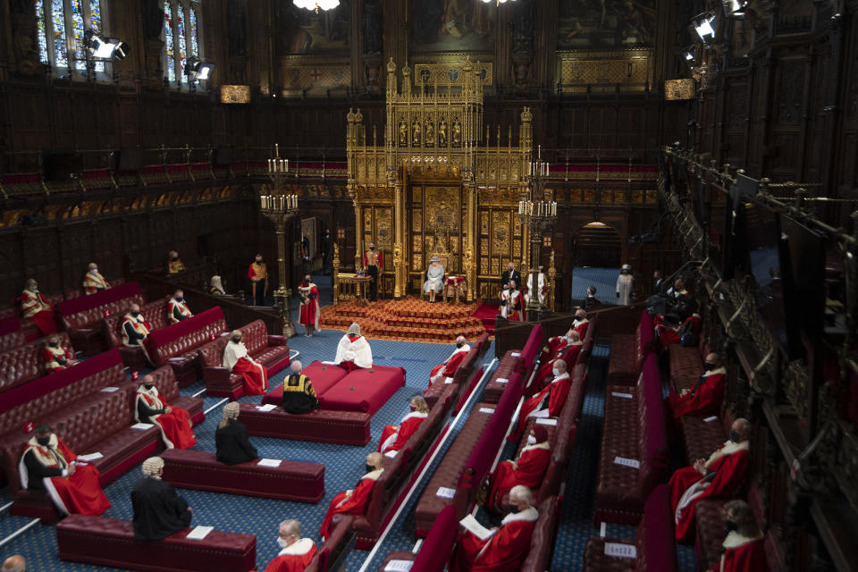 The State Opening of Parliament takes place with a reduced capacity due to Covid-19 restrictions. The State Opening of Parliament is where Queen Elizabeth II performs her ceremonial duty of informing parliament about the government's agenda for the coming year in a Queen's Speech. / Credit: EDDIE MULHOLLAND/POOL/AFP via Getty Images