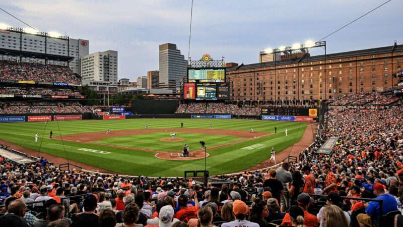Camden Yards, the ballpark for the Baltimore Orioles, is packed with fans.