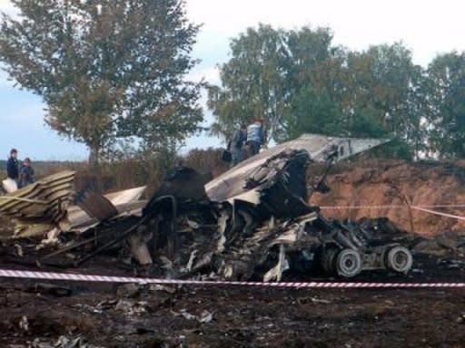 The wreckage of a Yak-42 passenger jet that crashed on takeoff, killing at least 43 people