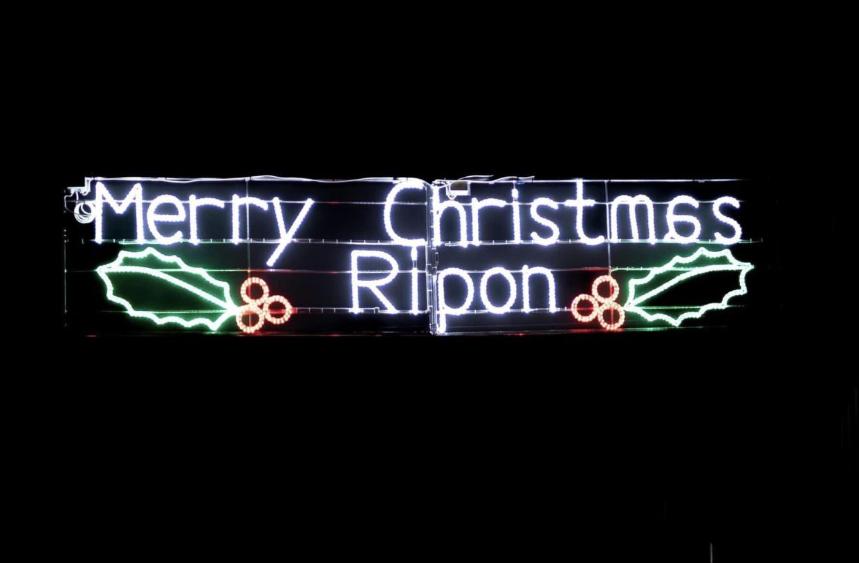 Picture of Christmas light display with a letter back to front that was put up in Ripon. (Triangle)