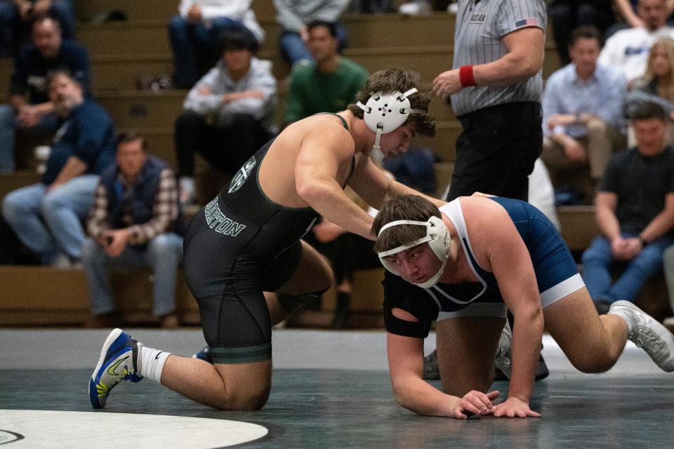 Jan 12, 2024; Morristown, NJ, USA; Pope John wrestling at Delbarton. (Left) Vincent Lee, of Delbarton, and 	Shawn Baumann, of Pope John, in their 215 pound match.