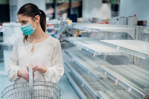 <span class="caption">According to behavioural science, people don't act rationally. </span> <span class="attribution"><a class="link " href="https://www.shutterstock.com/image-photo/woman-wearing-face-mask-buying-supermarketdrugstore-1675735018" rel="nofollow noopener" target="_blank" data-ylk="slk:eldar nurkovic/ Shutterstock;elm:context_link;itc:0;sec:content-canvas">eldar nurkovic/ Shutterstock</a></span>