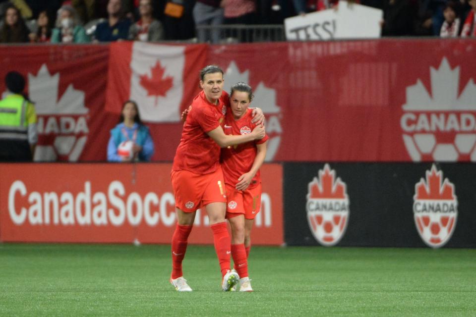 Women's Canadian National midfielder Jessie Fleming (17) celebrates her goal with forward Christine Sinclair (12) during the second half against Women's Nigeria National team at BC Place in Vancouver, BC, Canada on Apr 8, 2022.