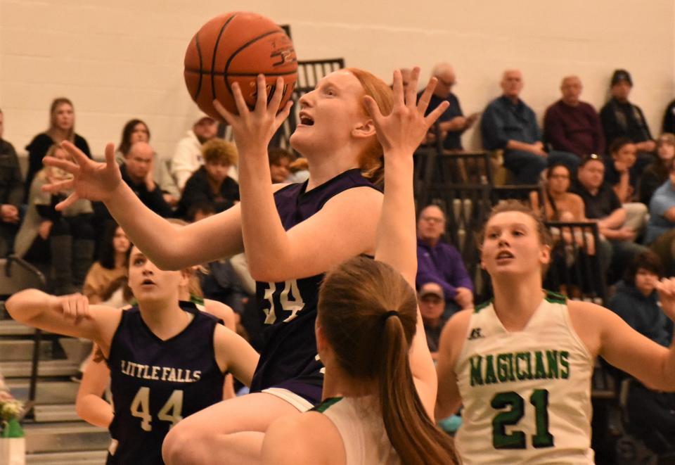 Little Falls Mountie Alexis Kress goes up with a shot against the Herkimer Magicians Monday.
