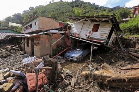 Destroyed houses are seen after a landslide sent mud and water crashing onto homes close to the municipality of Salgar in Antioquia department, Colombia May 19, 2015. REUTERS/Jose Miguel Gomez